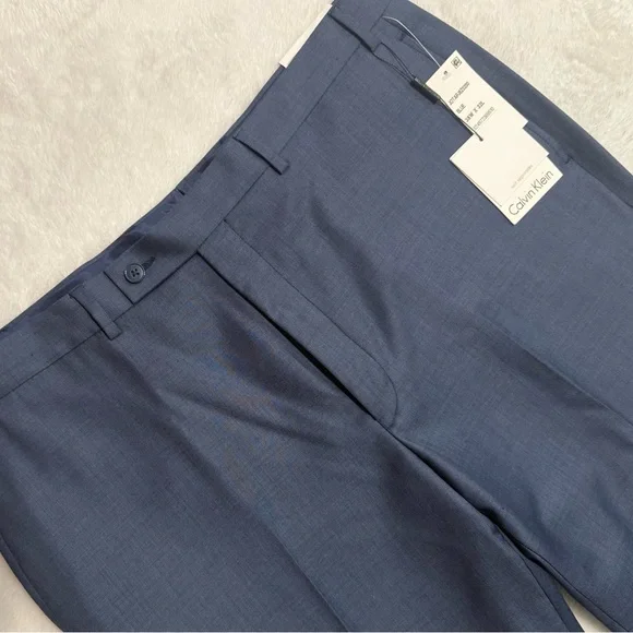 calvin klein blue dress pants CALVIN KLEIN Size 34 Blue Cotton Blend Tapered Zip Fly Dress Pants – Sui  Generis Designer Consignment